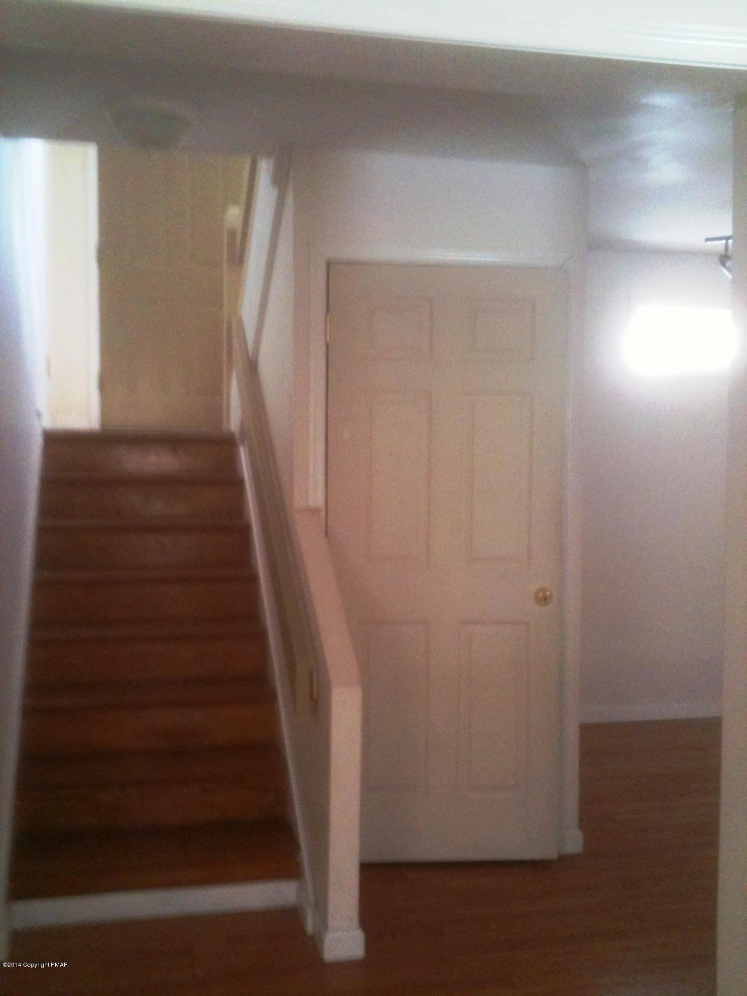 26 Lily Road East Stroudsburg, PA 18302 - Photo 27 of 48 a view of entryway with wooden floor
