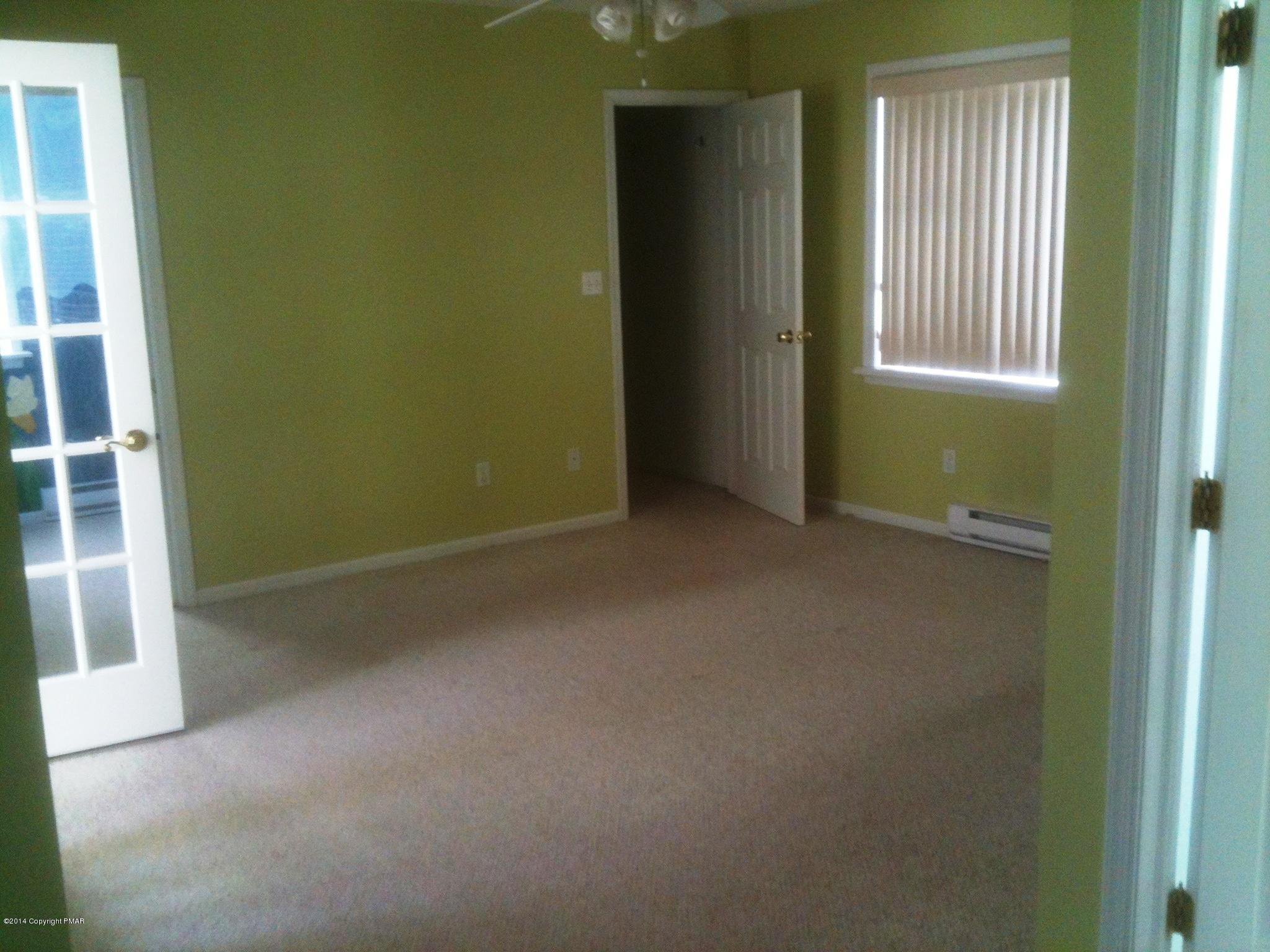 26 Lily Road East Stroudsburg, PA 18302 - Photo 3 of 48 an empty room with windows