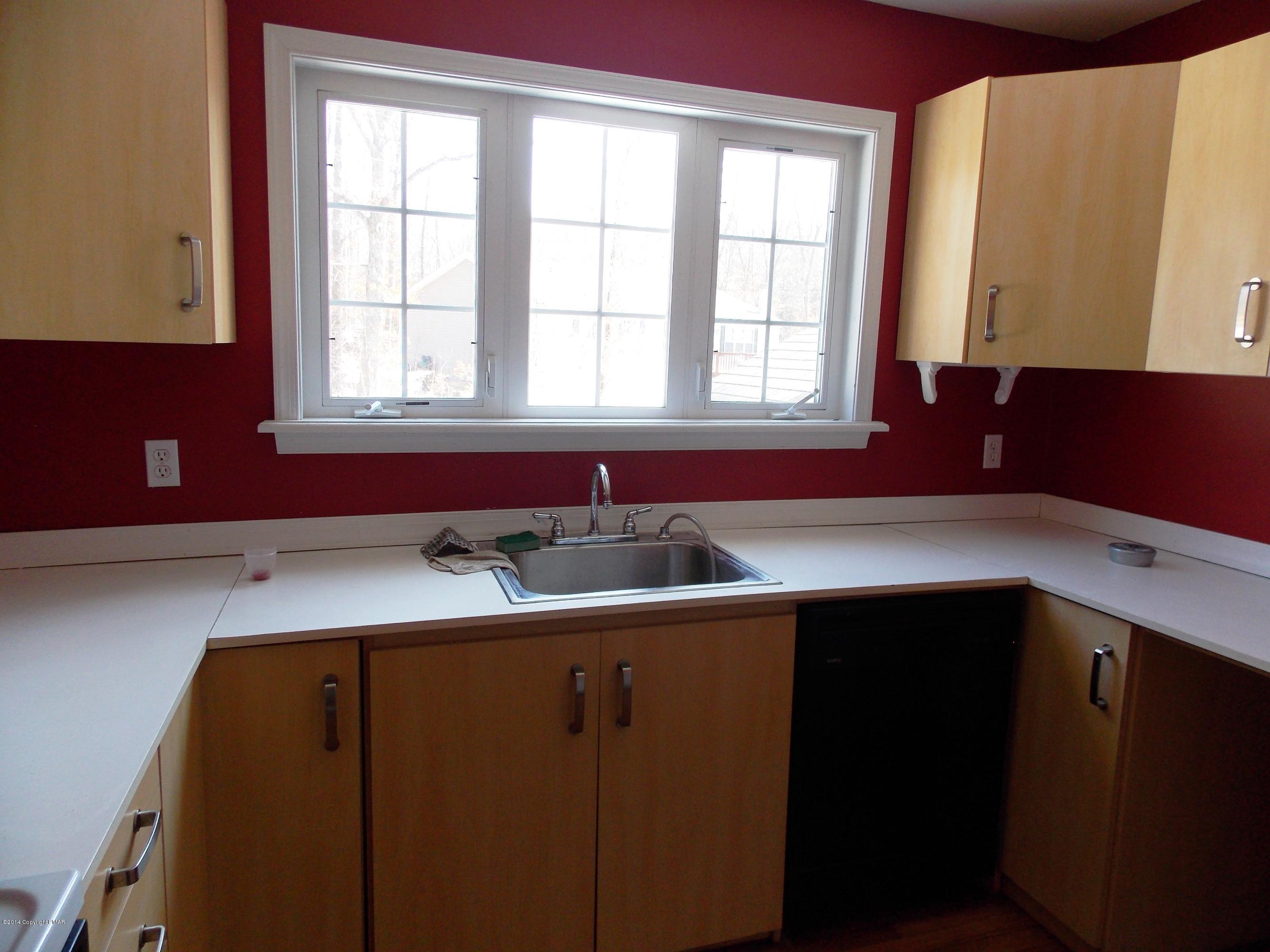 26 Lily Road East Stroudsburg, PA 18302 - Photo 43 of 48 a kitchen with a sink and a window