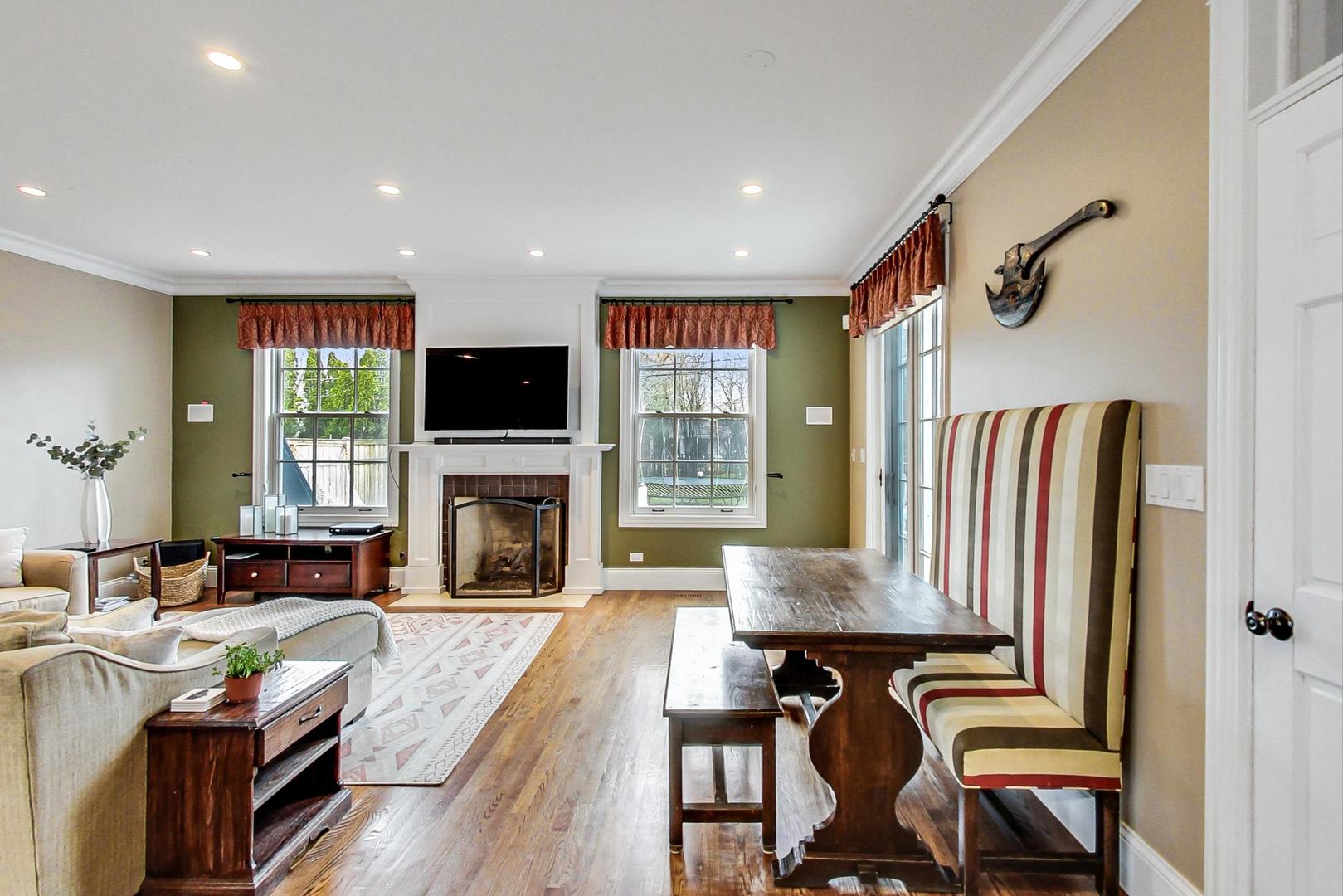 615 Windsor Road Glenview, IL 60025 - Photo 12 of 51 a living room with fireplace furniture and a fireplace