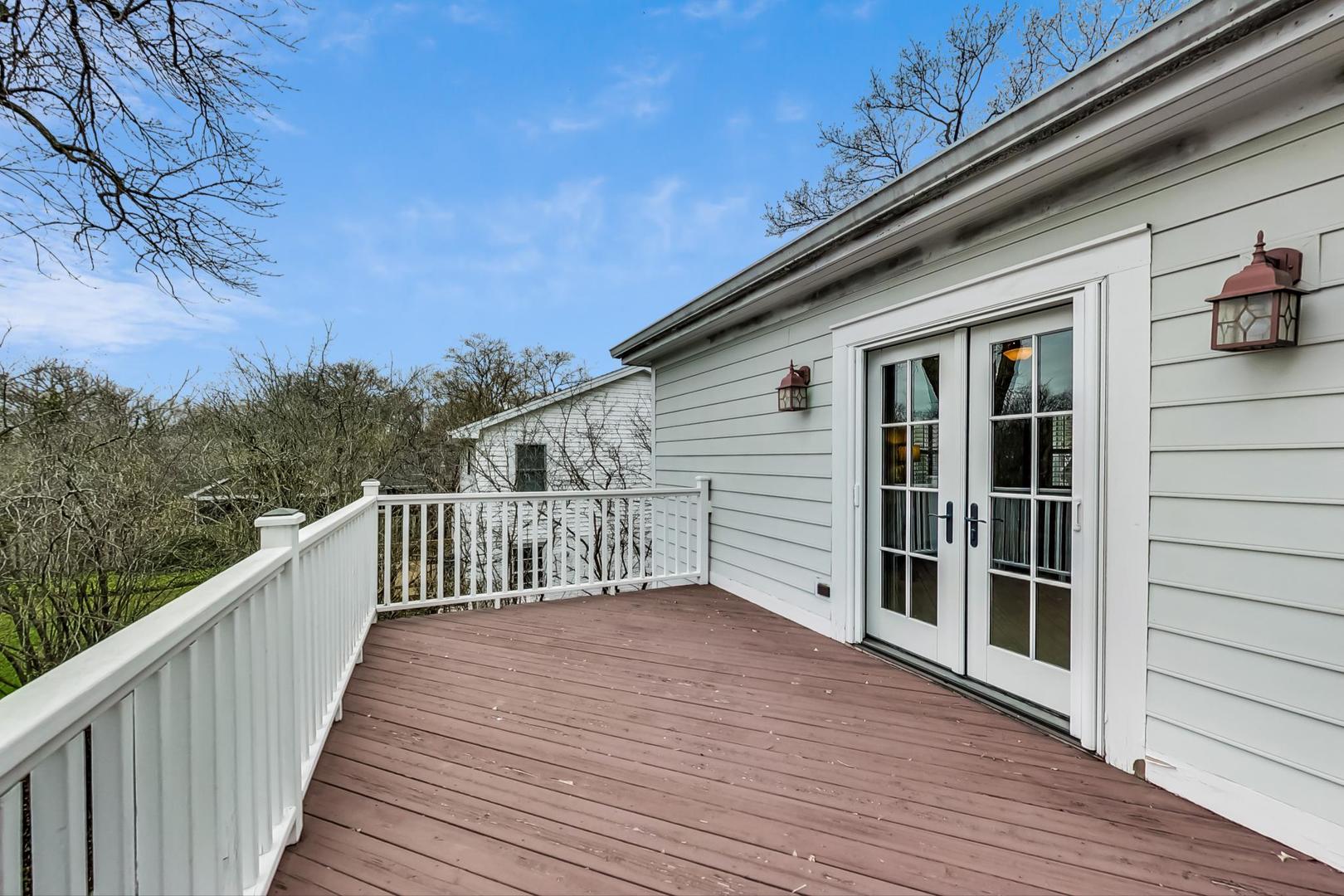 615 Windsor Road Glenview, IL 60025 - Photo 28 of 51 a view of a house with wooden deck