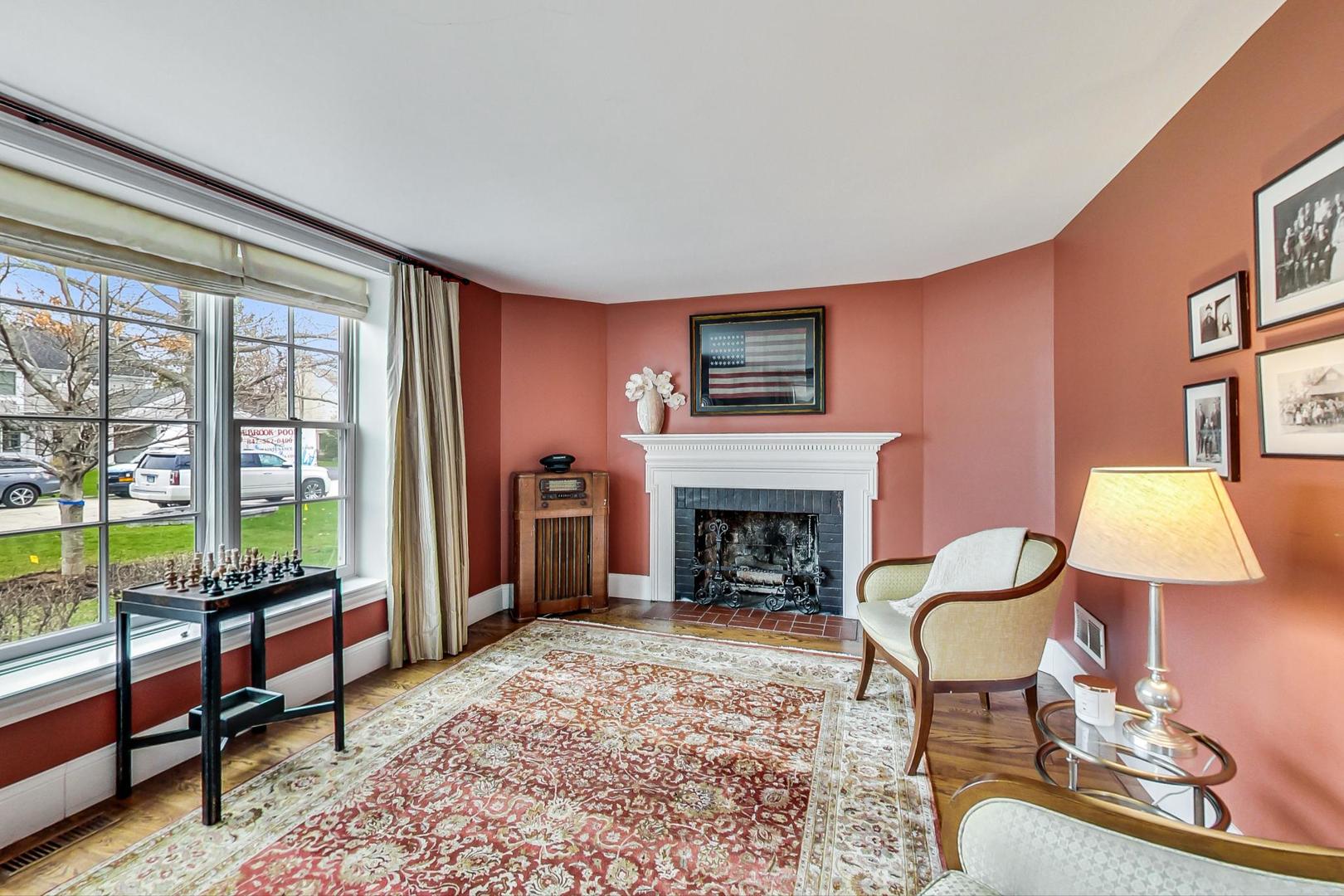 615 Windsor Road Glenview, IL 60025 - Photo 3 of 51 a living room with furniture and a fireplace