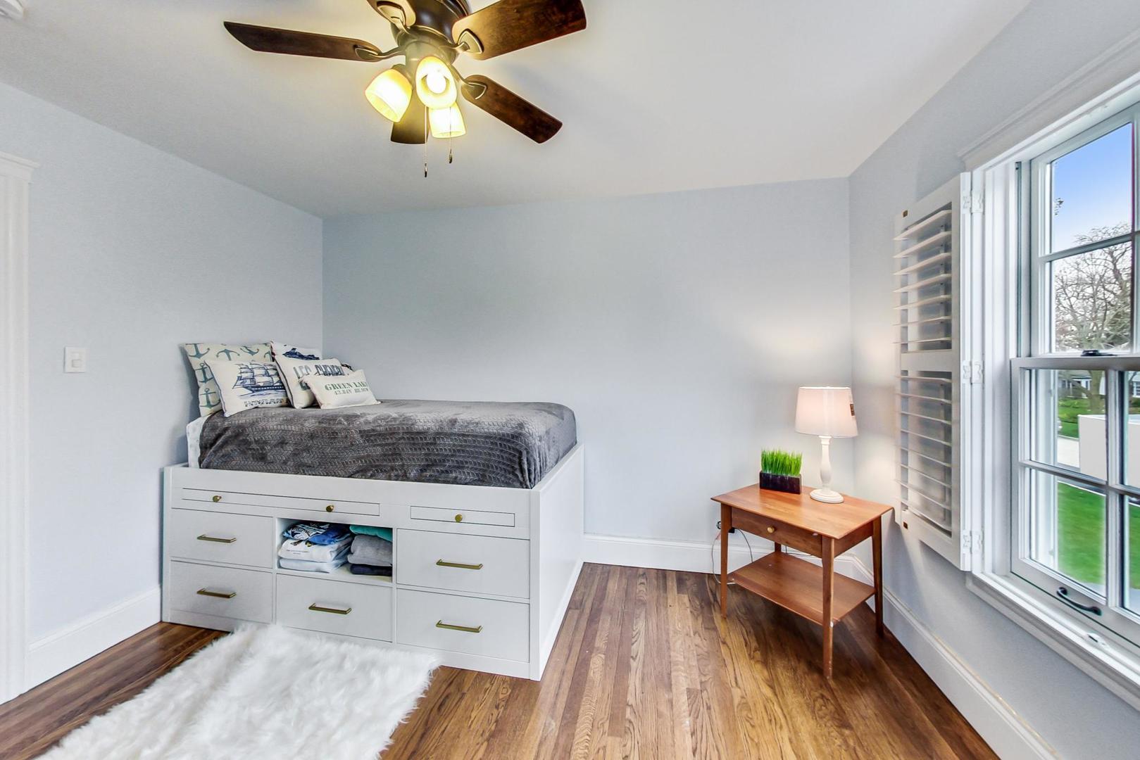 615 Windsor Road Glenview, IL 60025 - Photo 32 of 51 a living room with furniture and a wooden floor