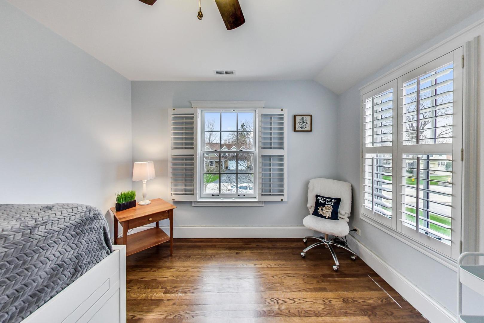 615 Windsor Road Glenview, IL 60025 - Photo 33 of 51 a living room with furniture and a window
