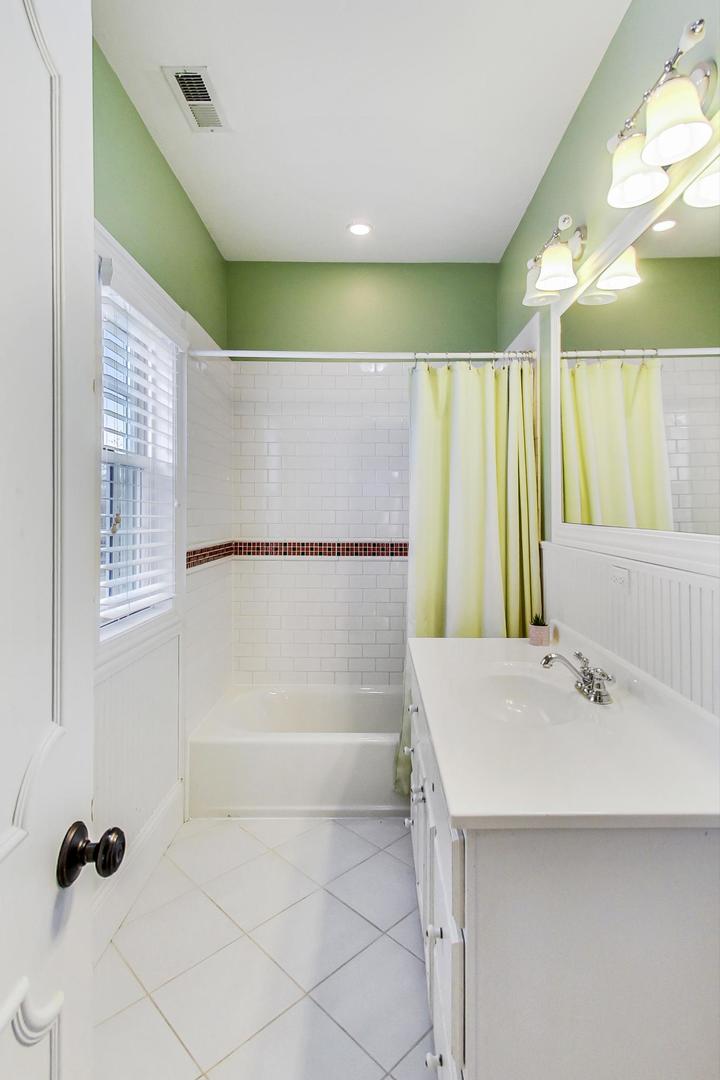 615 Windsor Road Glenview, IL 60025 - Photo 34 of 51 a bathroom with a shower and a sink