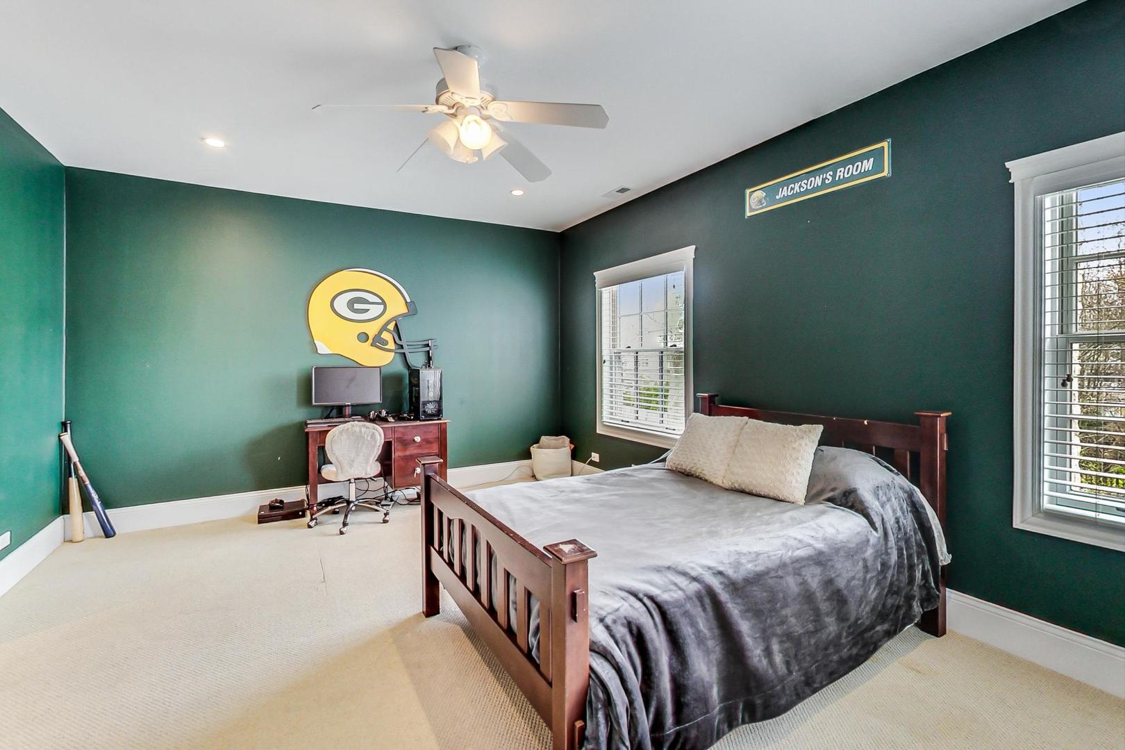 615 Windsor Road Glenview, IL 60025 - Photo 36 of 51 a bedroom with a bed and window