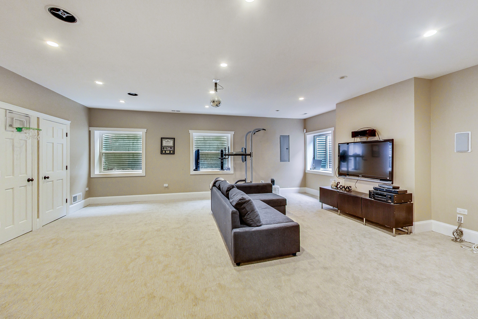 615 Windsor Road Glenview, IL 60025 - Photo 41 of 51 a living room with furniture and a flat screen tv