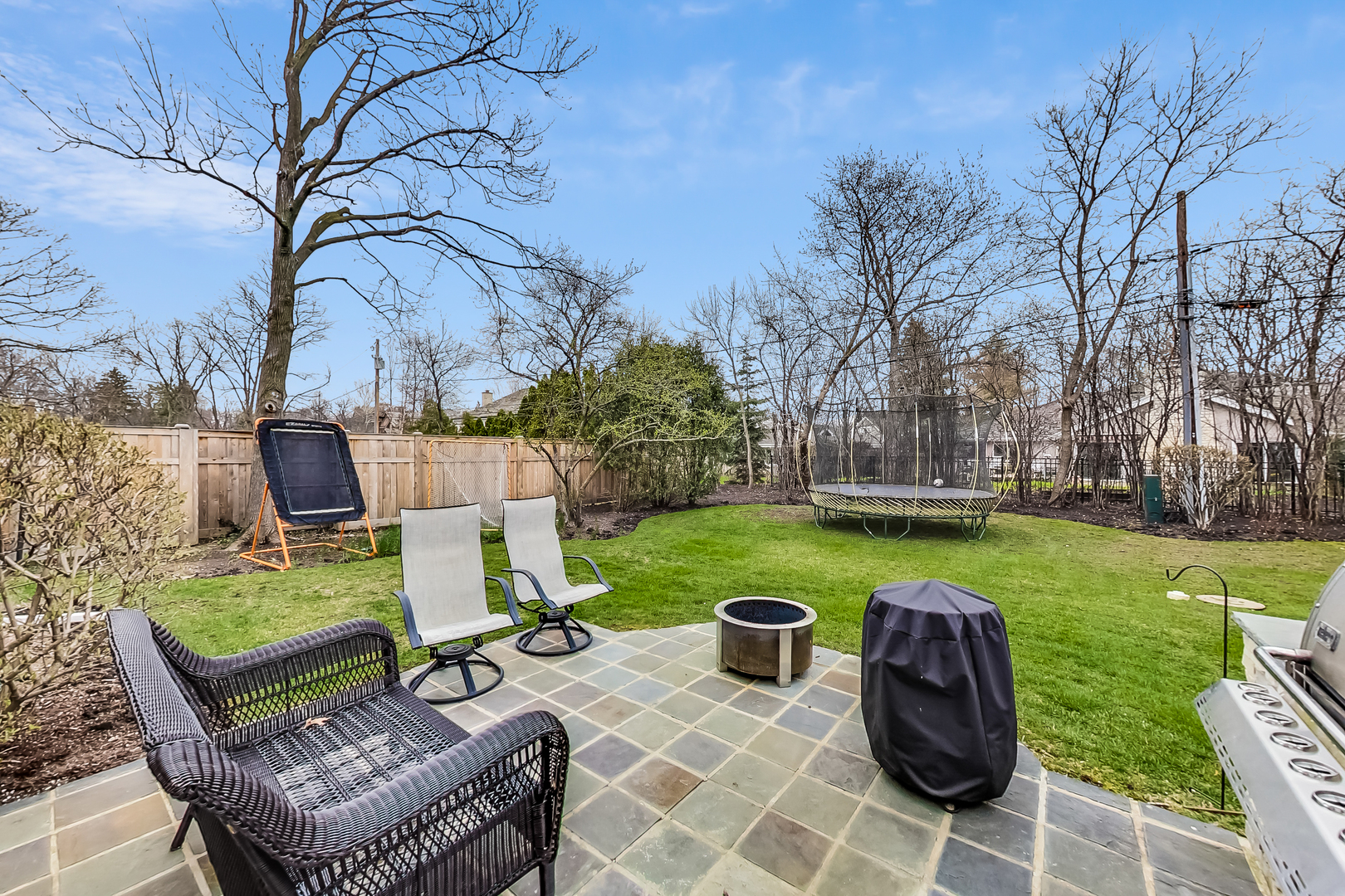 615 Windsor Road Glenview, IL 60025 - Photo 47 of 51 a view of a chairs and table in backyard of the house