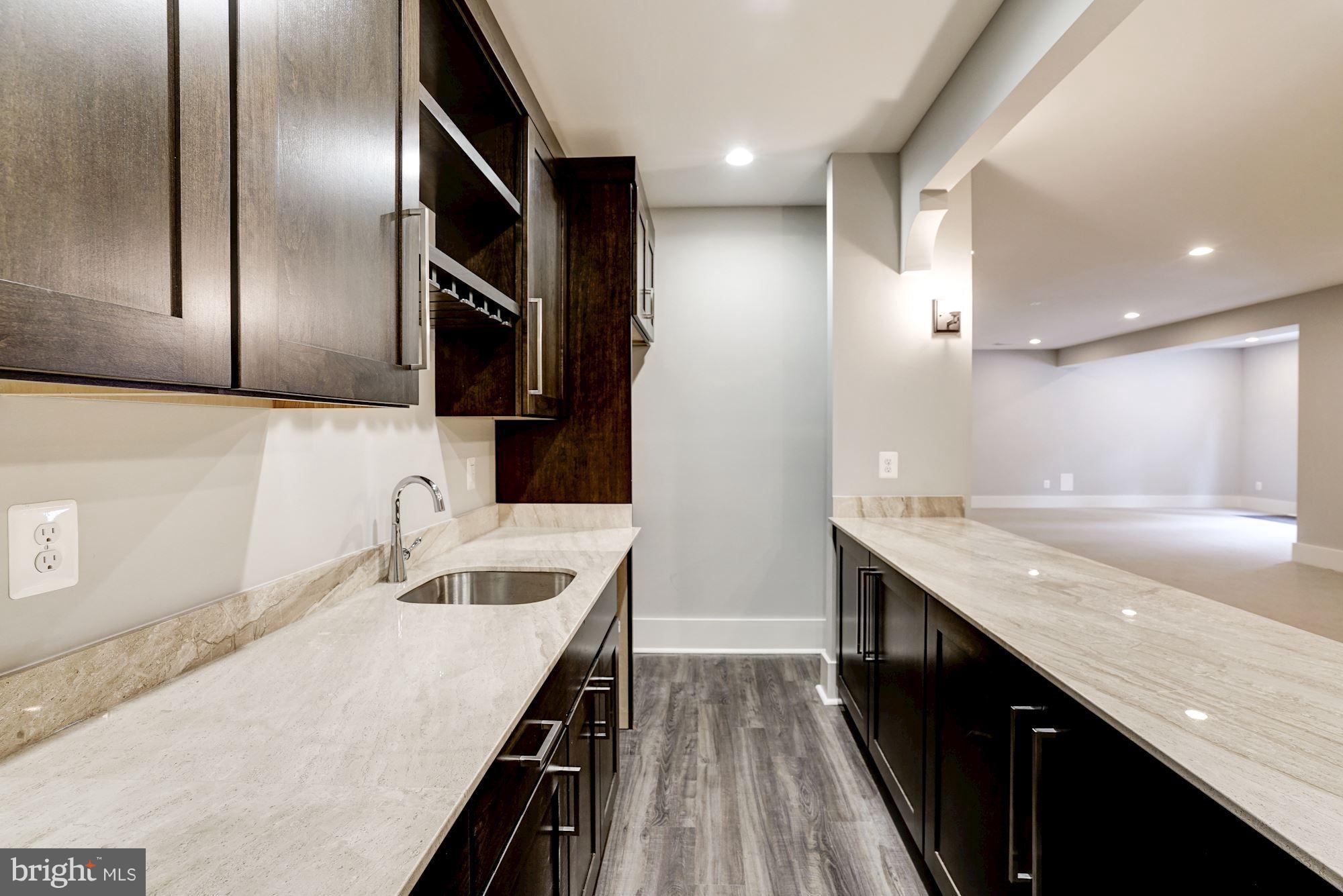 6166 Cobbs Road Alexandria, VA 22310 - Photo 23 of 30 Deluxe walk-behind wet bar w/ custom cabinetry