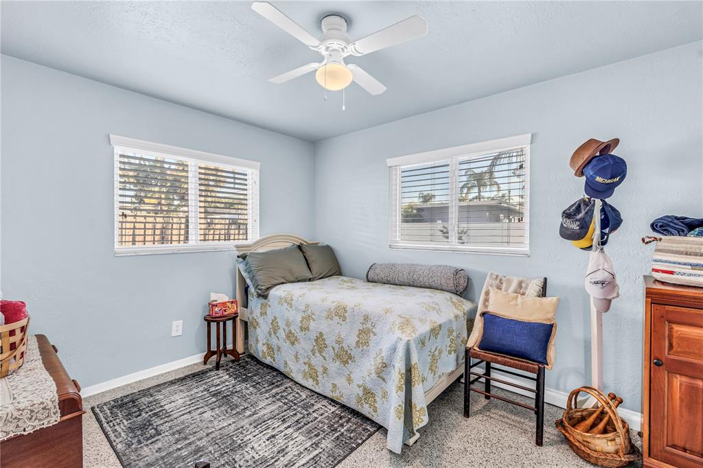 10020 Panama Court Seminole, FL 33776 - Photo 18 of 25 a bedroom with a bed and a window