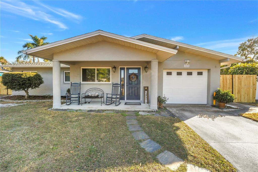10020 Panama Court Seminole, FL 33776 - Photo 2 of 25 a view of a house with patio