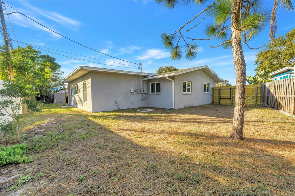10020 Panama Court Seminole, FL 33776 - Photo 22 of 25 a view of a house with a yard