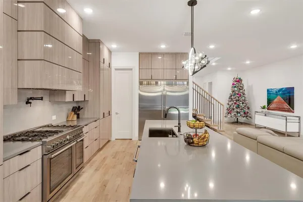 a dining room with furniture window and wooden floor