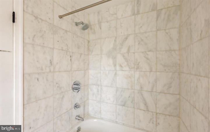 2317 37th Street Northwest Washington, DC 20007 - Photo 43 of 54 Elegant marble shower retreat.