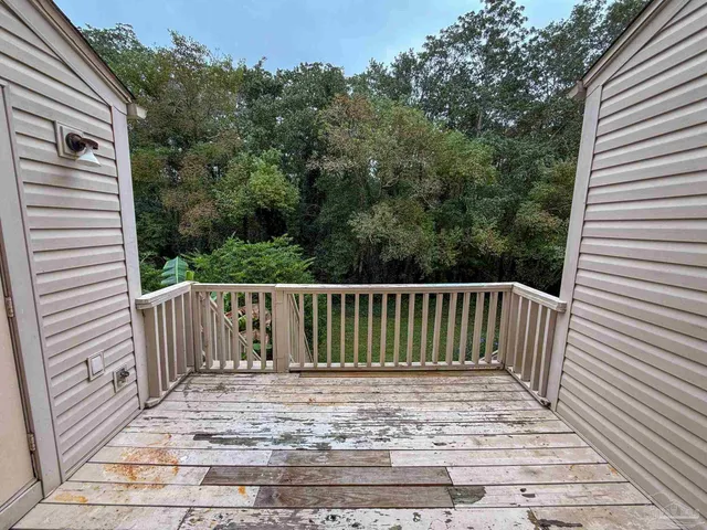 a view of a wooden fence