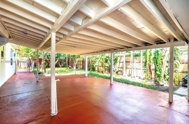 a utility room with sink dryer and washer