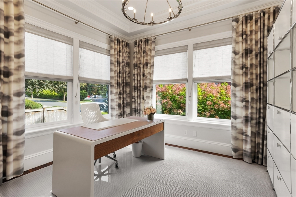 32 Forest Street Lexington, MA 02421 - Photo 12 of 33 a room with a large window and a chandelier