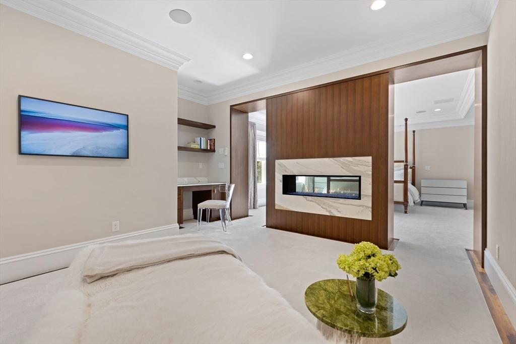 32 Forest Street Lexington, MA 02421 - Photo 15 of 33 a living room with furniture and a fireplace