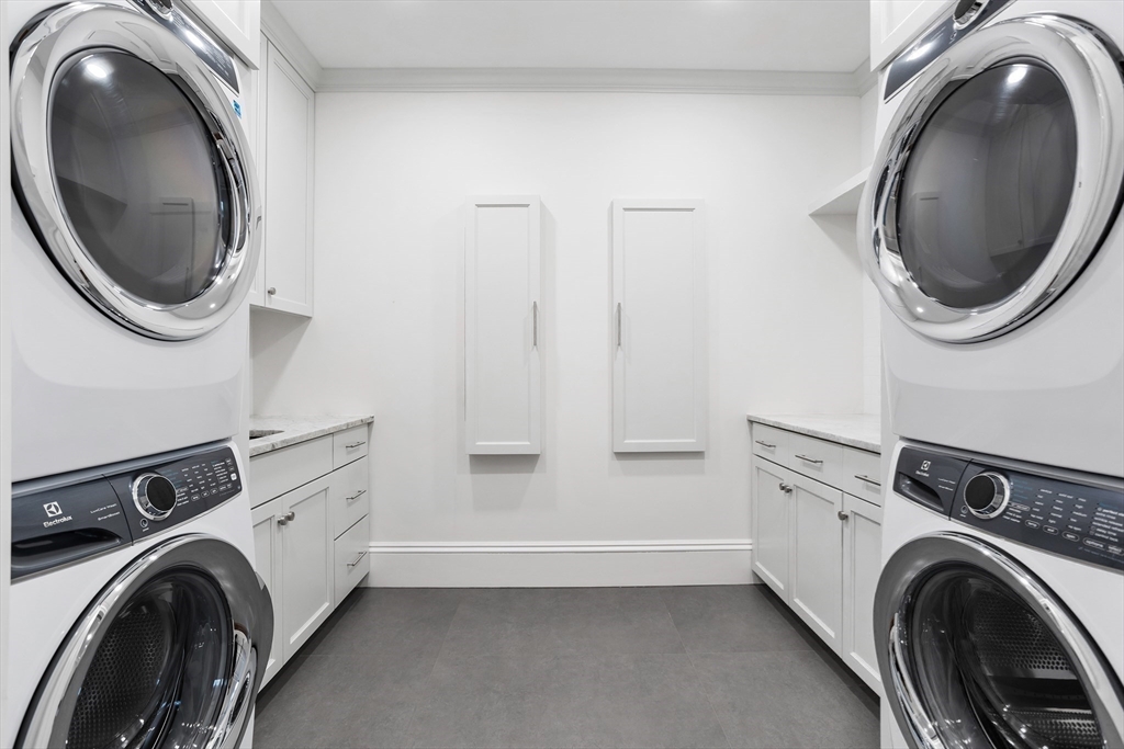 32 Forest Street Lexington, MA 02421 - Photo 22 of 33 a utility room with dryer and washer