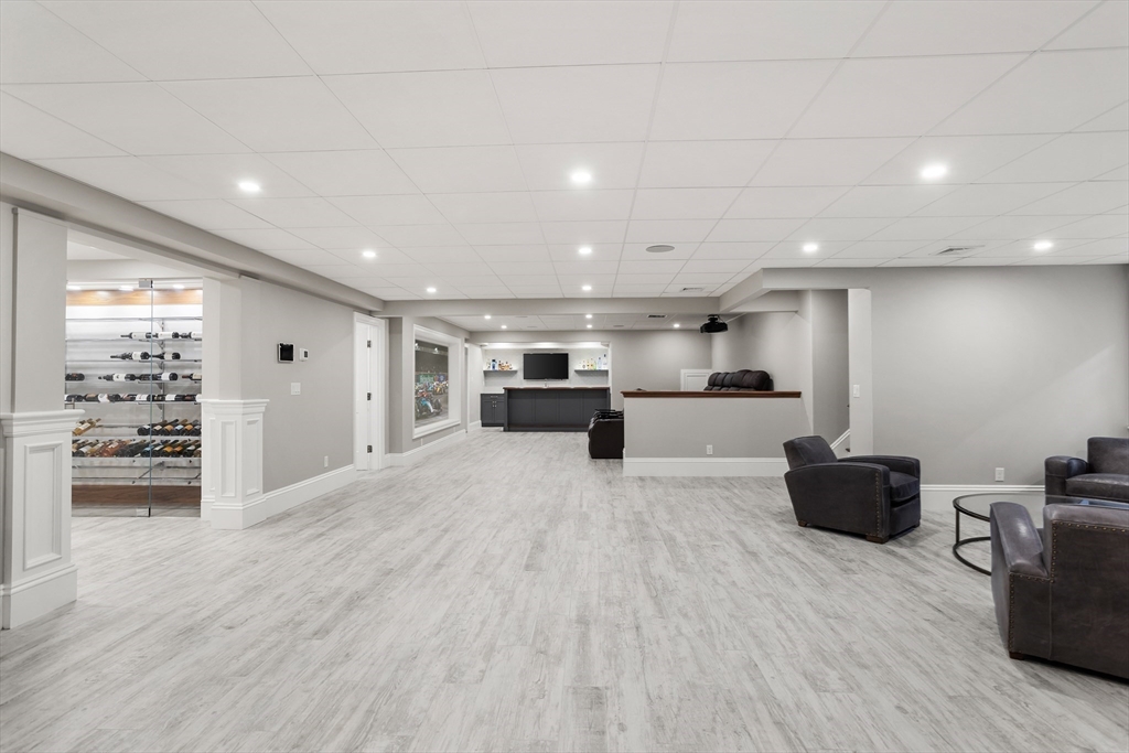 32 Forest Street Lexington, MA 02421 - Photo 23 of 33 a living room with furniture and a large window