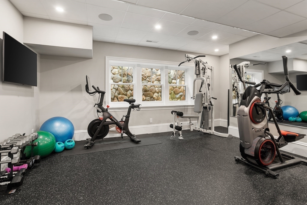 32 Forest Street Lexington, MA 02421 - Photo 26 of 33 a view of a room with gym equipment