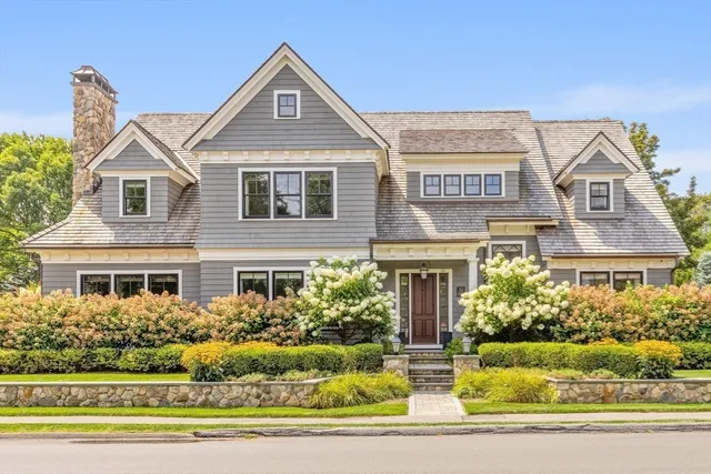 front view of a house with a yard