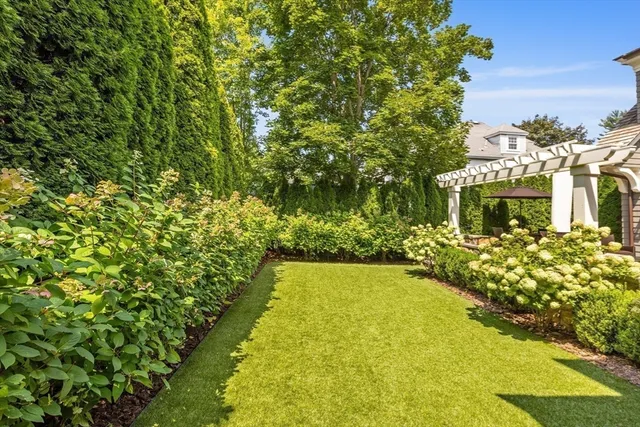 a view of swimming pool with outdoor seating