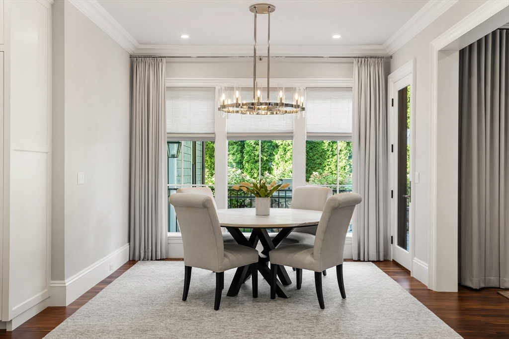 32 Forest Street Lexington, MA 02421 - Photo 9 of 33 a view of a dining room with furniture window and wooden floor