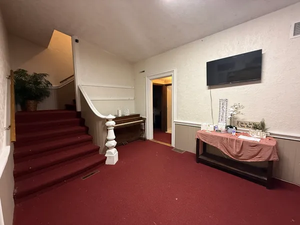 a view of balcony with wooden floor