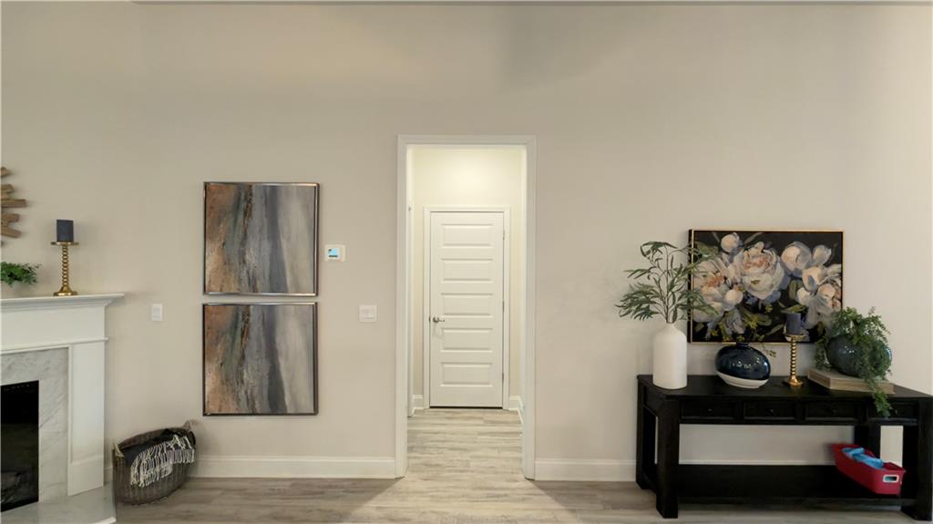 620 Bald Ridge Circle Demorest, GA 30535 - Photo 14 of 43 a room with a door and a painting on the wall
