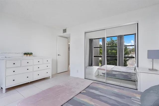 a view of a bedroom from a hallway