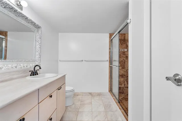 a view of a balcony with furniture