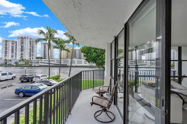 a view of balcony with furniture