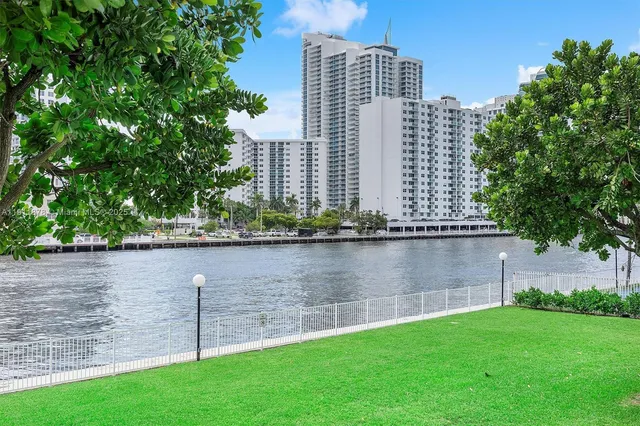 a view of a swimming pool with a garden