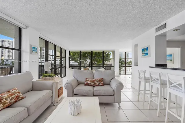 a kitchen with a sink and a refrigerator
