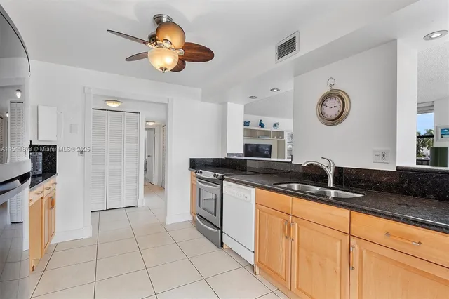 a view of living room with furniture and window