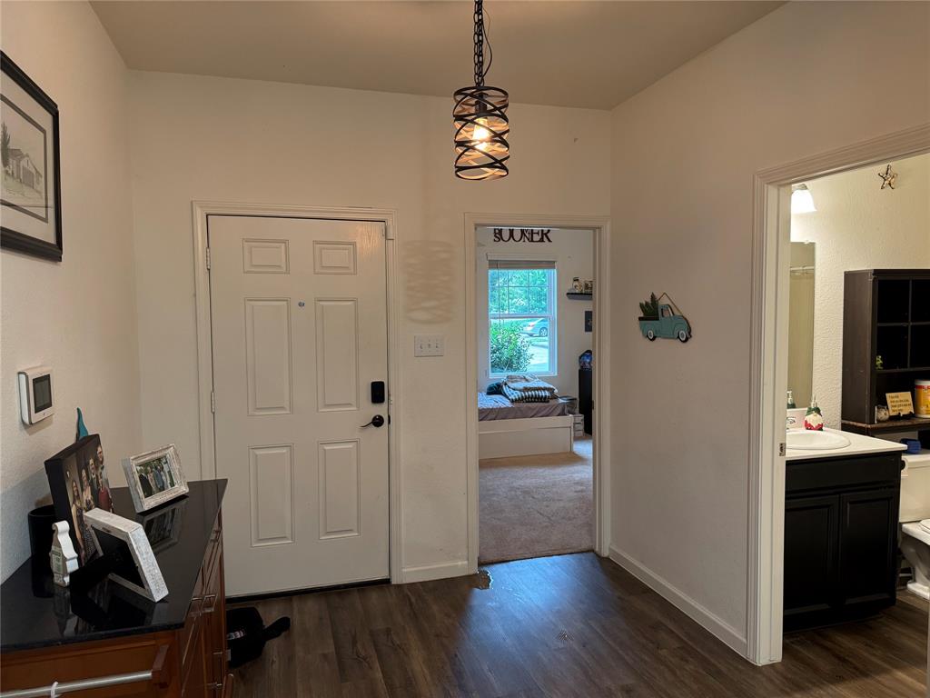 2209 Cinnamon Spgs Road Glenn Heights, TX 75154 - Photo 21 of 28 Wood-finish flooring throughout the entryway