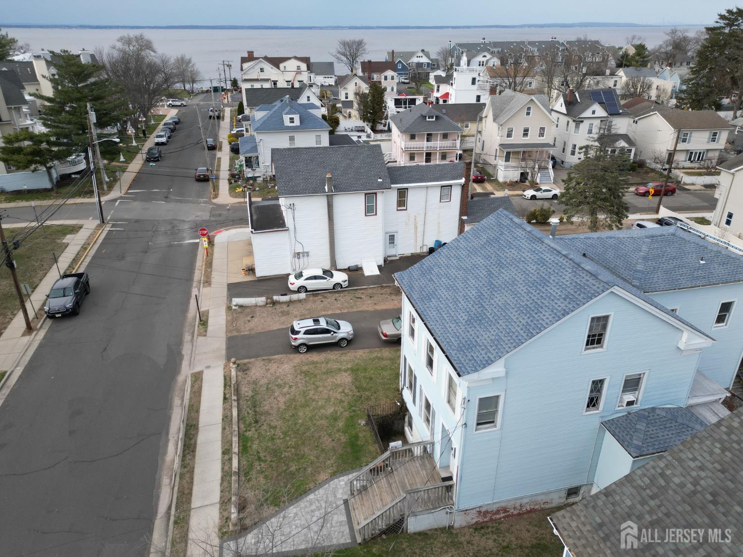 41 Atlantic Street Keyport, NJ 07735 - Photo 37 of 48 a view of a house with a terrace