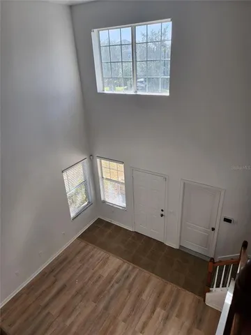 an empty room with windows