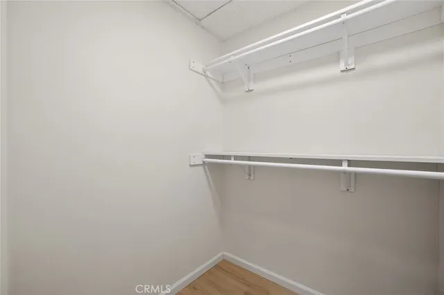 a view of a room with racks on the wall