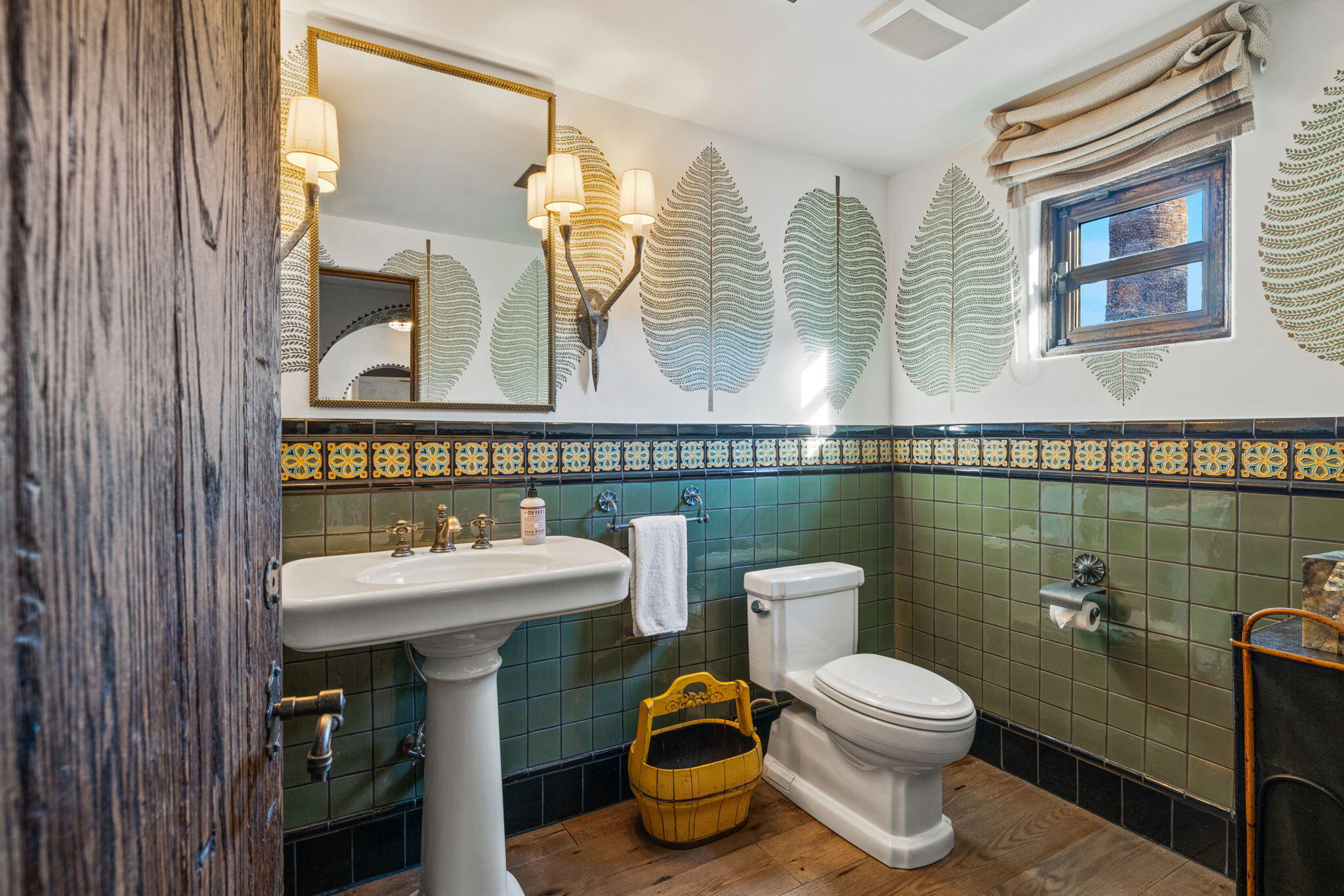 535 North Belardo Road Palm Springs, CA 92262 - Photo 22 of 45 a bathroom with a toilet sink and mirror