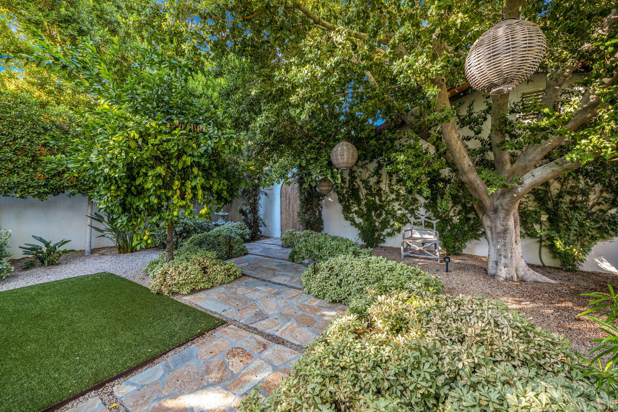 535 North Belardo Road Palm Springs, CA 92262 - Photo 32 of 45 a view of a backyard with table and chairs and potted plants