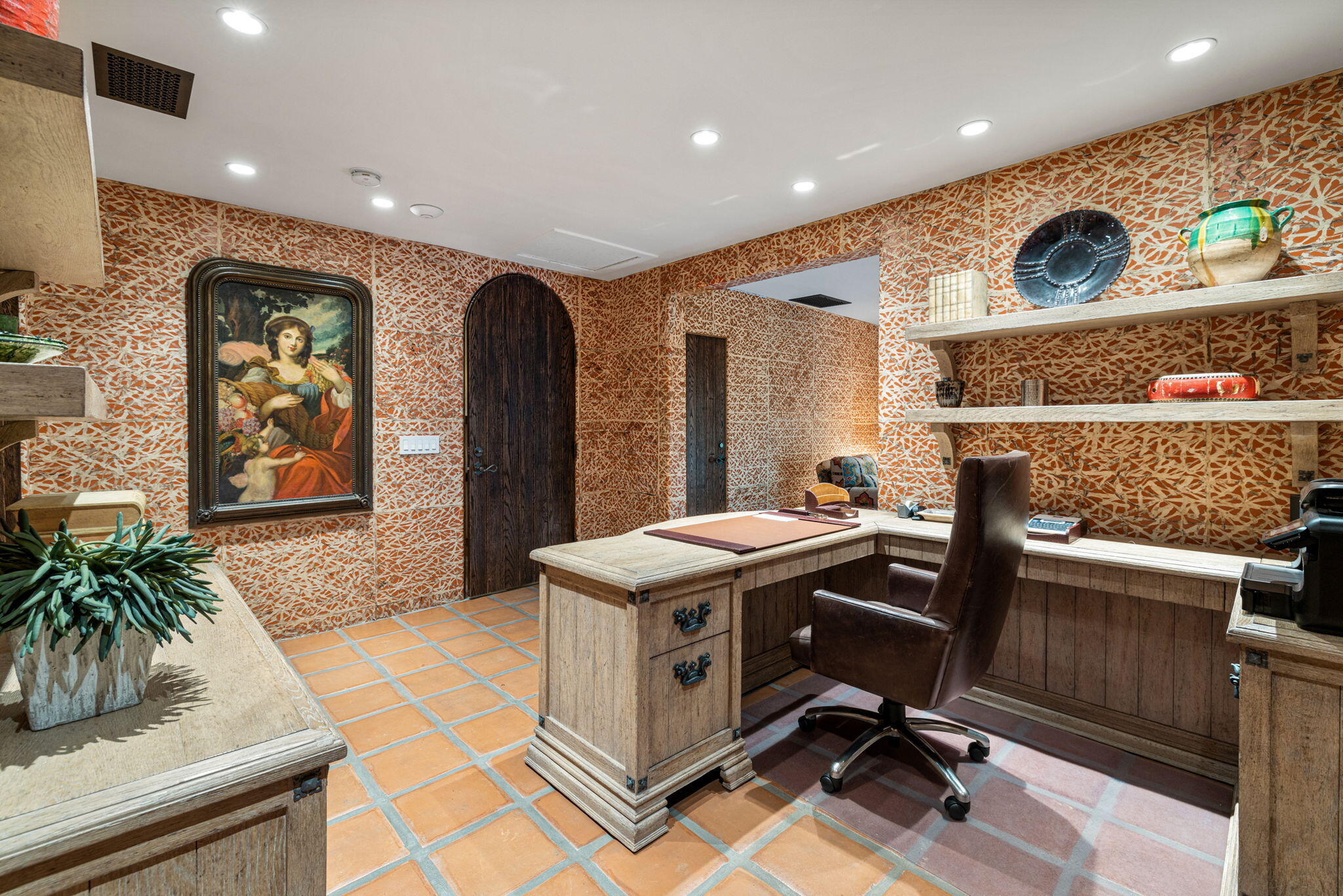535 North Belardo Road Palm Springs, CA 92262 - Photo 37 of 45 a view of a workspace with furniture and a potted plant