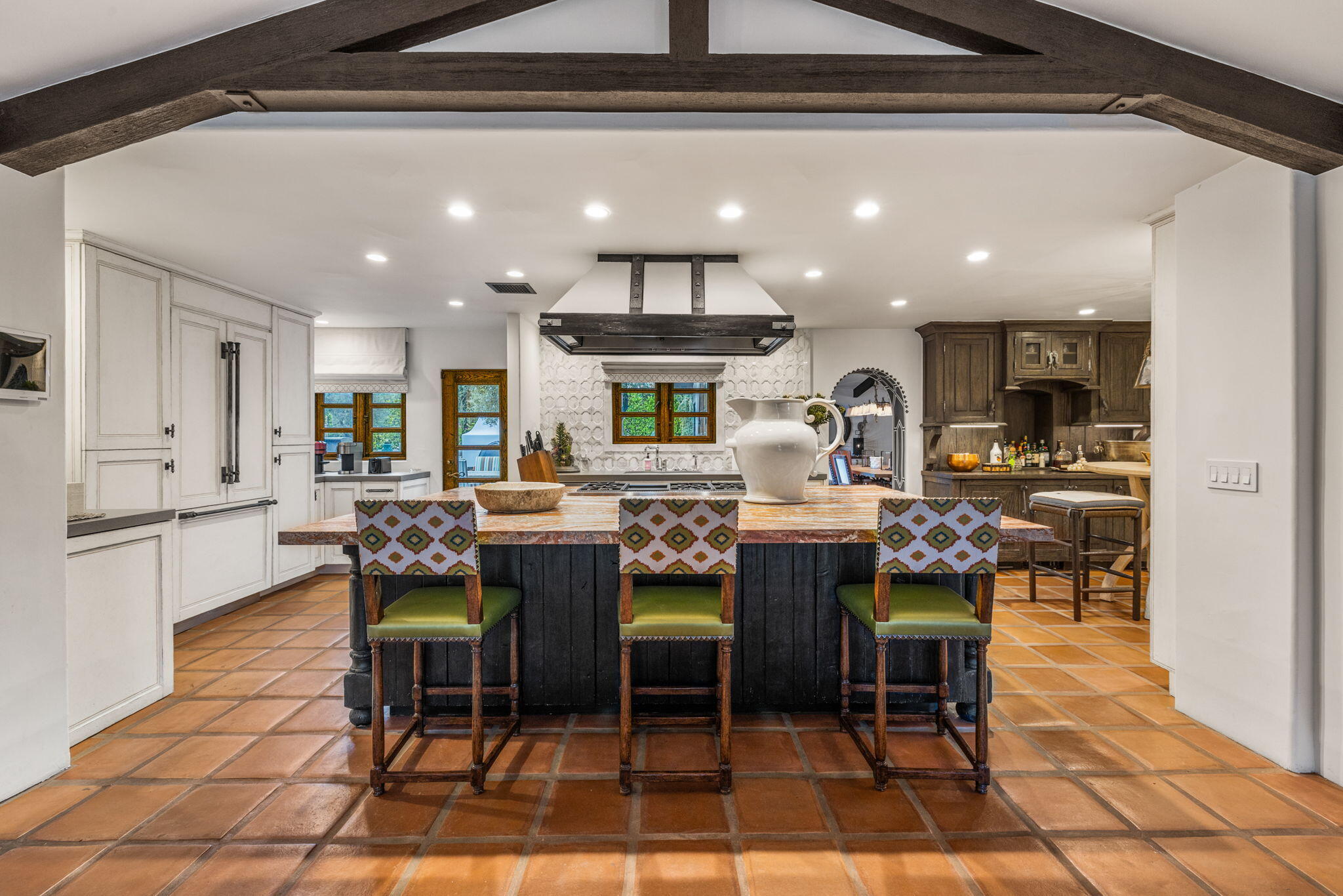 535 North Belardo Road Palm Springs, CA 92262 - Photo 4 of 45 a dining hall with stainless steel appliances kitchen island granite countertop a dining table and chairs