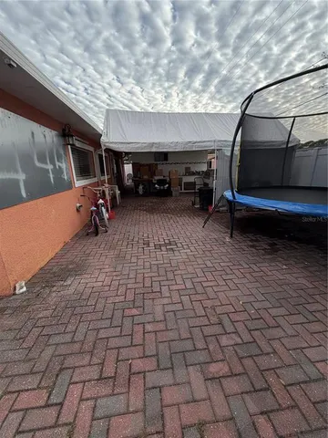 a view of a porch with furniture