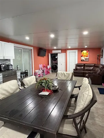 a view of a dining room with furniture