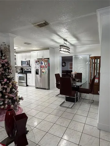 a view of a workspace with furniture