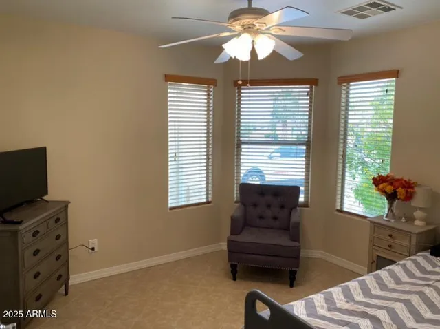 a living room with furniture and a window