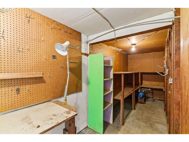 a spacious bathroom with a granite countertop sink mirror and a