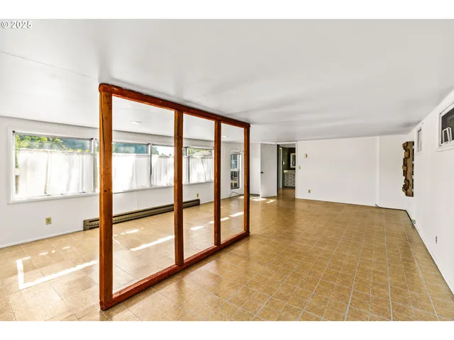 a view interior of a house wooden floor and a chandelier